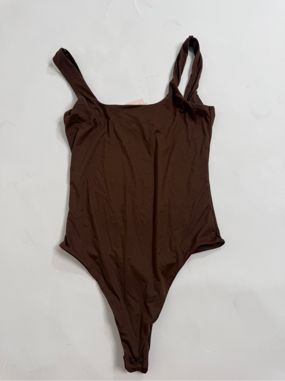 Victoria's Secret brown bodysuit with tags.